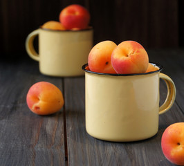 Juicy fresh peaches in a bucket
