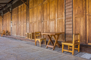 Wooden doors, table, chairs and floor of old Thai house