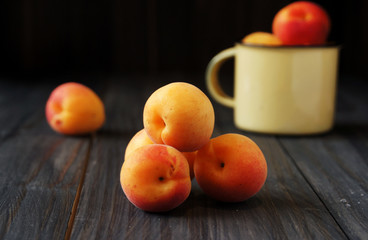 Juicy fresh peaches in a bucket