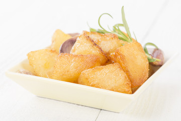 Roast Potatoes - White potatoes roasted with garlic and rosemary