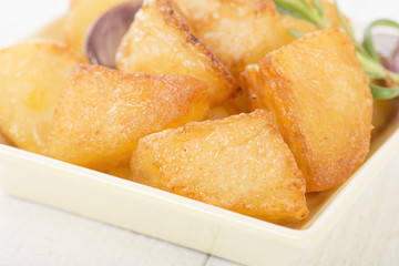 Roast Potatoes - White potatoes roasted with garlic and rosemary