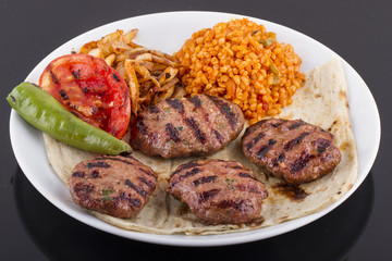 Meatballs or Burger with salad and garnish