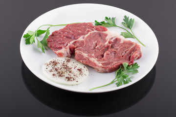 Fresh Red Beef Ribs with Dill and Green Sprouts