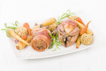 Roasted Quail - Quail roasted with carrots, parsnips & stuffin