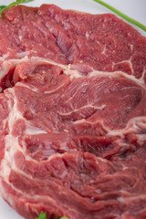 Fresh Red Beef Ribs with Dill and Green Sprouts