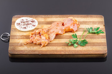 Raw Chicken Breasts On Plate