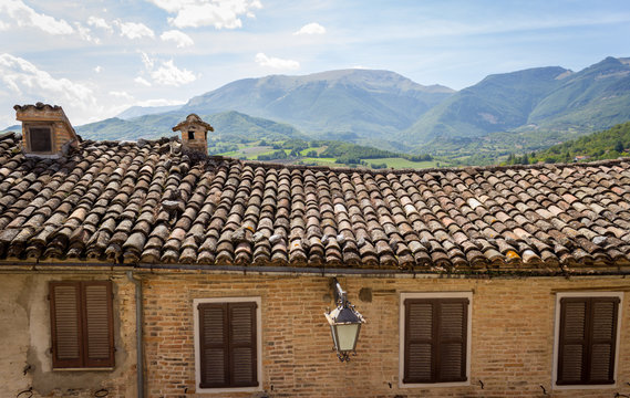 View of an old house and Sibillini Mountains