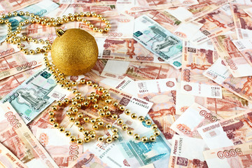 Christmas ball on russian money background
