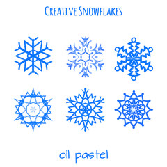 Set of snowflake hand drawn with oil pastels