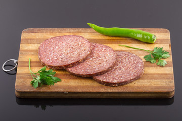 Raw Turkish Ottoman Sausage on the Wooden Board