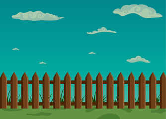 Wooden fence and green grass with sky