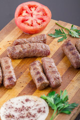 inegol Meatball on a wood plate