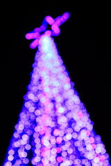 Bokeh of big christmas light tree