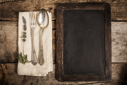 Blackboard with spoon and fork