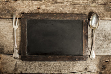 Blackboard with spoon and fork © ramoncin1978