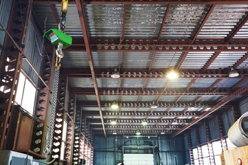 hoist with bridge crane and scales in warehouse