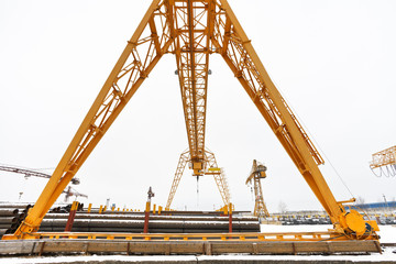 overhead crane over outdoor warehouse