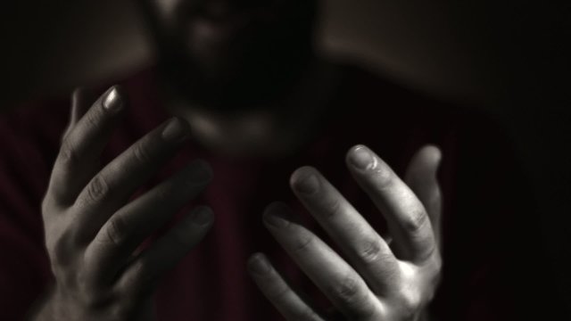 Muslim man praying to god. Black and White