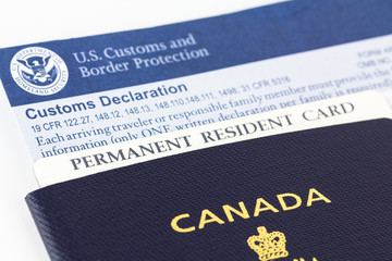 Canadian passport, permanent resident card and form.