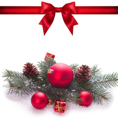 Red ribbon bow end bauble on white background. Christmas tree.