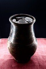 jug with coins