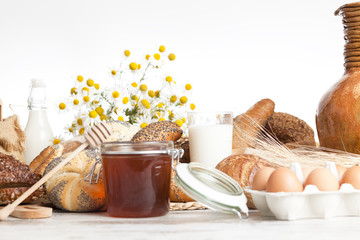 full corn bread, honey and milk © pawel70