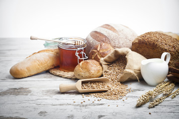 full corn bread, honey and milk © pawel70