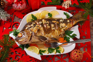 roasted carp stuffed with vegetables for christmas