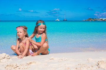 Adorable little girls in swimsuit and glasses for swimming at