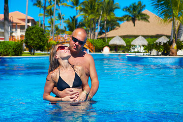 Loving couple in pool