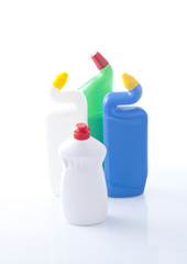 Fototapeta na wymiar plastic bottle, cleaning sponges and gloves isolated