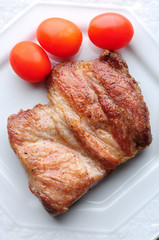 pork steak with cherry tomatos