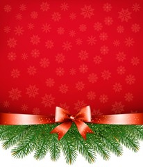 Red christmas background with ribbon and branches. Vector.