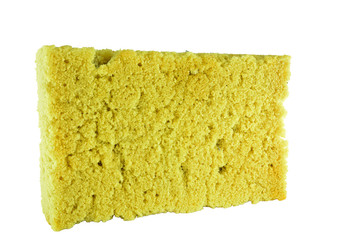 old used yellow sponge on white background