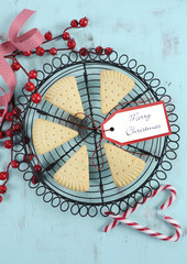 Traditional Christmas shortbread triangle shape cookies
