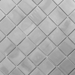 Gray wall tiles as a background or texture
