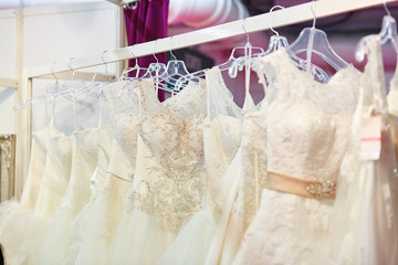 Collection of wedding dresses in a shop