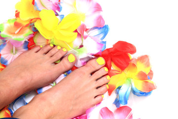 Obraz na płótnie Canvas women feet (pedicure) with flowers