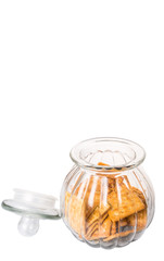 Sugar crackers or biscuits in a cookie jar over white background