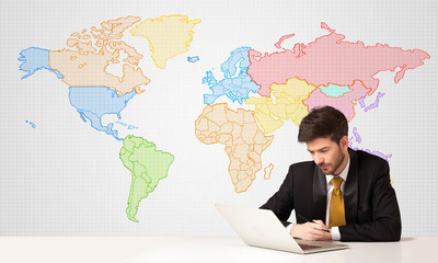 Business man with colorful world map background