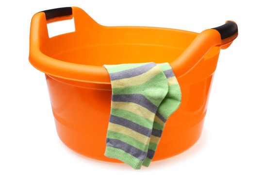 Orange Plastic Wash Bowl With Striped Socks