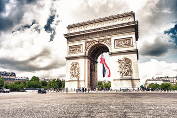 Fototapeta na wymiar PARIS - MAY 21, 2014: Tourists at Arc de Triomphe. More than 30