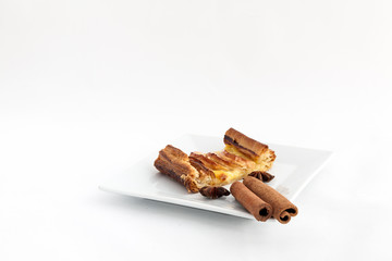 Apple pie with cinnamon isolated on white background
