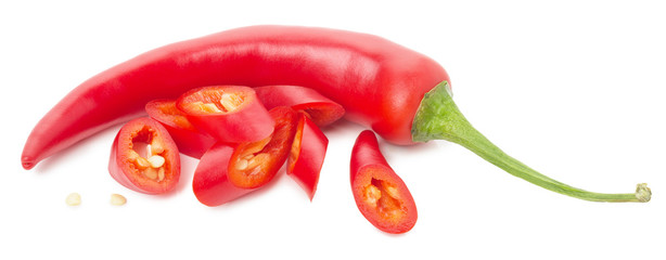red chilli peppers with slices isolated on the white background