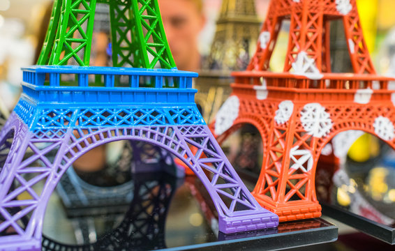 PARIS - JULY 20, 2014: Colourful miniatures of Eiffel Towers. Th