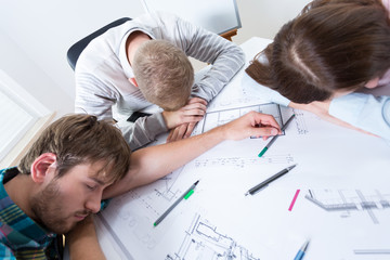 Fototapeta premium Architects fell asleep while working
