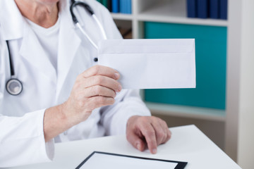 Brribe in doctor's hands