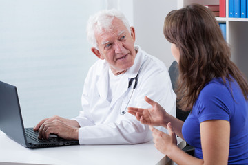 Fototapeta premium Woman visiting experienced physician