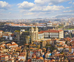 Fototapeta na wymiar Roofs of old city and The Porto Cathedral in Porto