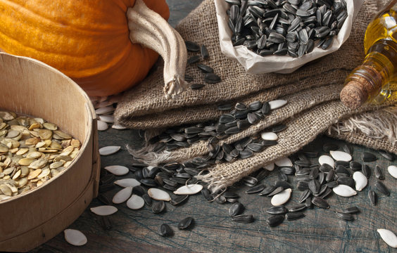 Pumpkin And Sunflower Seeds On The Table